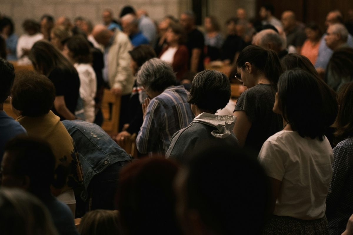 diverse crowd to symbolize christian humility and charity celebrating unity and abundance